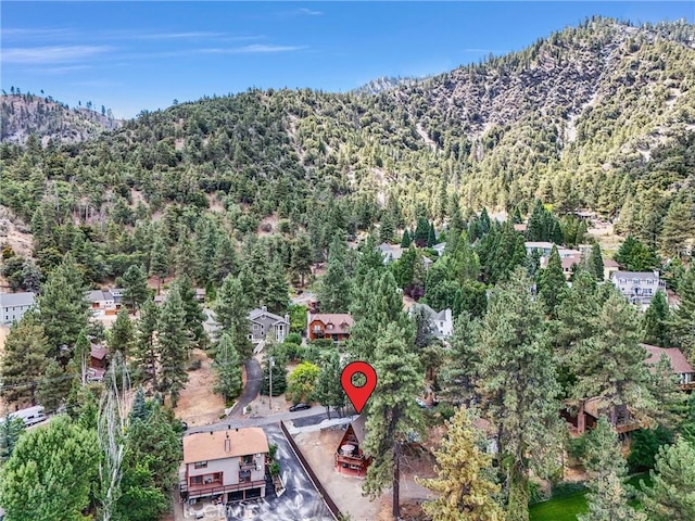 1830 W Ash Rd, Wrightwood, CA 92397 - aerial overview of property's location featuring a forest and a mountainous background