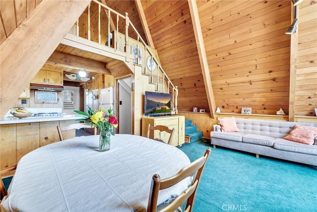 carpeted dining room featuring wooden walls, beam ceiling, wood ceiling, and high vaulted ceiling