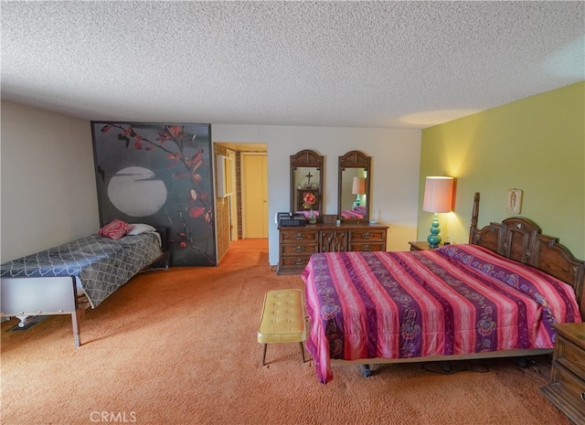 bedroom featuring light carpet and a textured ceiling