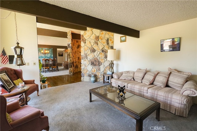 living room with beam ceiling, a textured ceiling, and carpet flooring