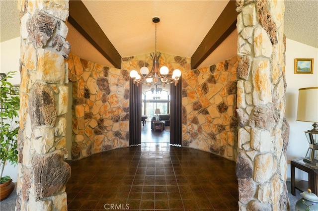 unfurnished dining area with a notable chandelier, vaulted ceiling with beams, and a textured ceiling