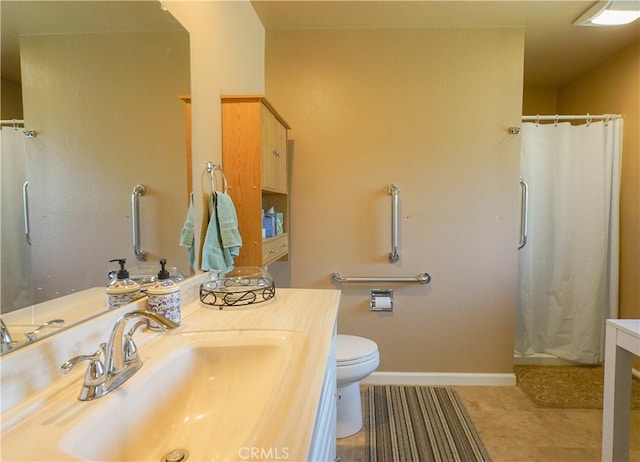 bathroom featuring curtained shower, tile patterned flooring, vanity, and toilet