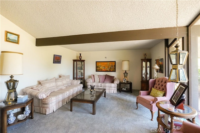 living room with lofted ceiling, a textured ceiling, and carpet floors