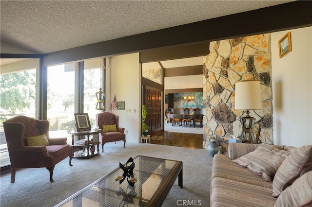 carpeted living room featuring vaulted ceiling with beams, a textured ceiling, and plenty of natural light