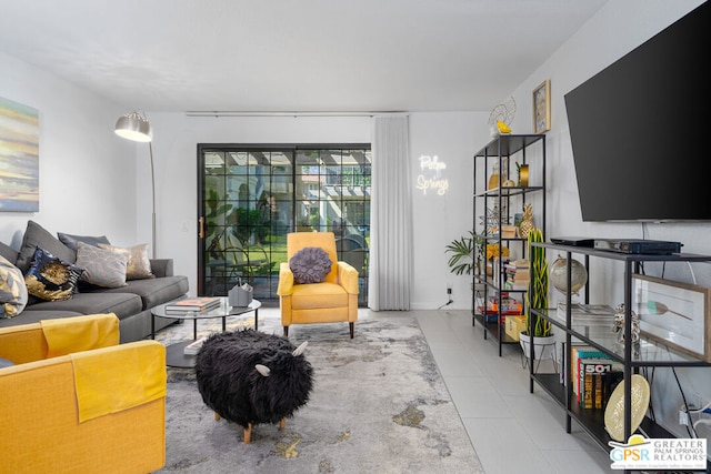 living room featuring light tile patterned flooring