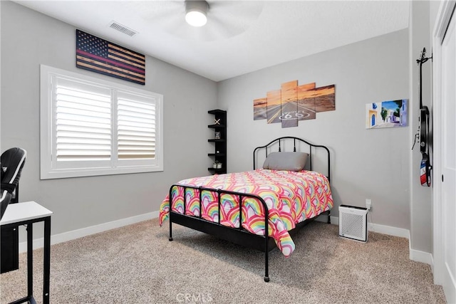 bedroom featuring ceiling fan and carpet flooring