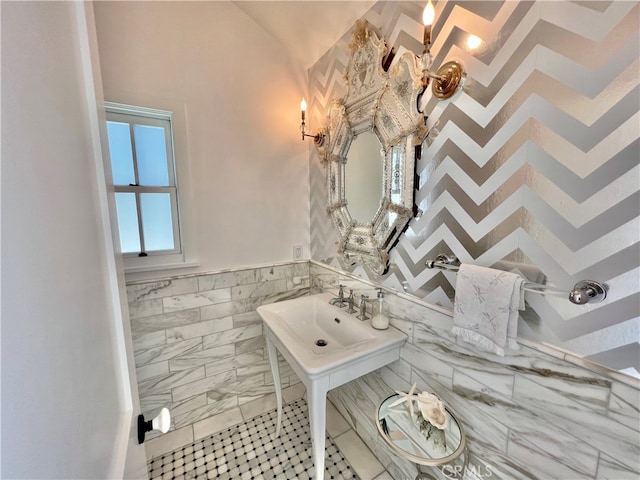 bathroom with tile walls