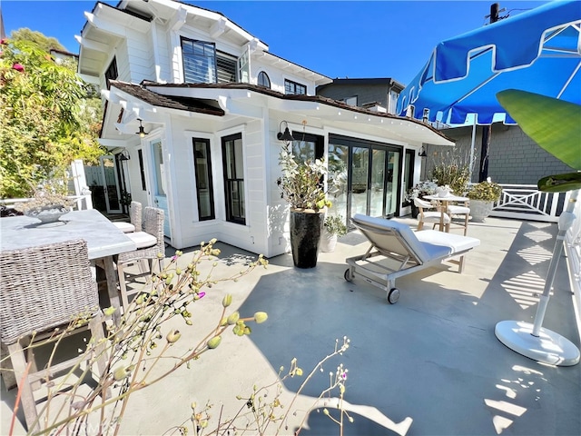 back of house featuring a patio