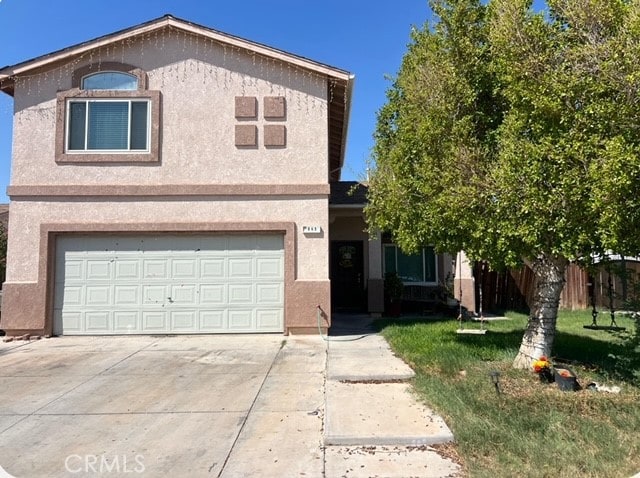 view of property with a garage