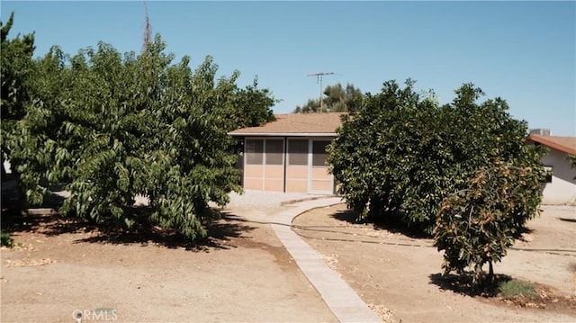 view of front facade featuring a sunroom