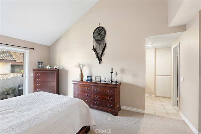 carpeted bedroom featuring high vaulted ceiling