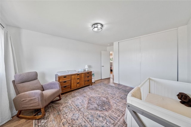 bedroom with light wood-type flooring