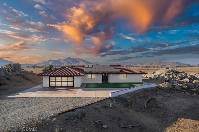 view of front of house with a mountain view