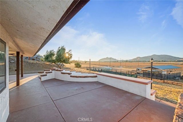 view of patio with a mountain view