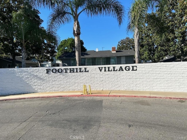 view of community sign