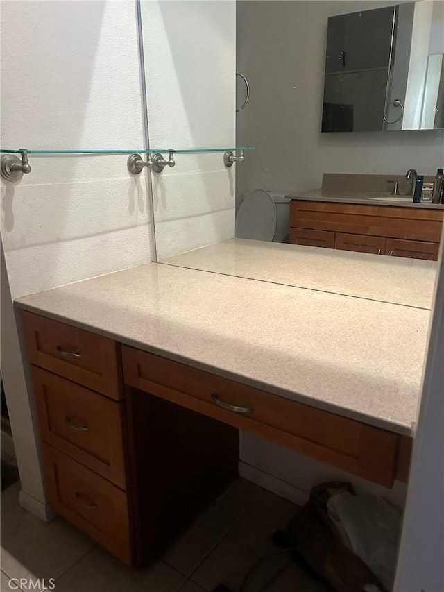 bathroom featuring tile patterned floors and vanity