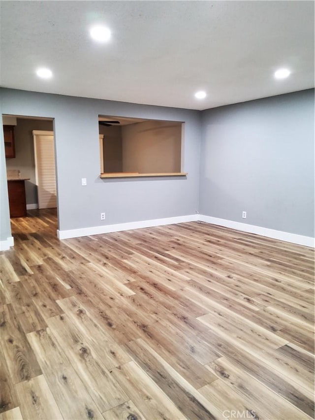 empty room featuring hardwood / wood-style flooring