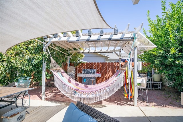 view of patio featuring a pergola