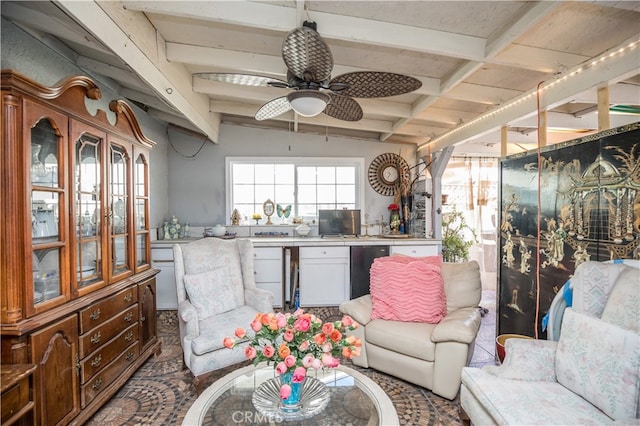 living room with vaulted ceiling with beams and ceiling fan