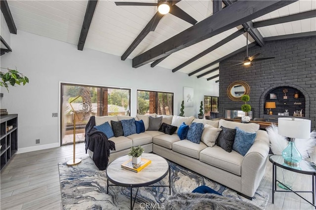 living room featuring beam ceiling, ceiling fan, high vaulted ceiling, and wood-type flooring