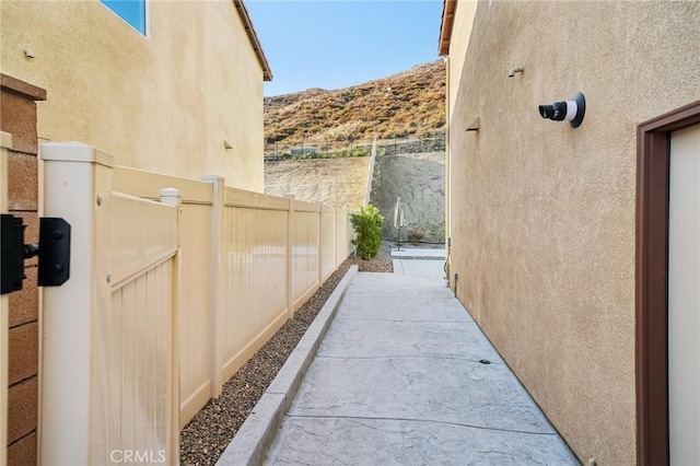 view of home's exterior with a mountain view