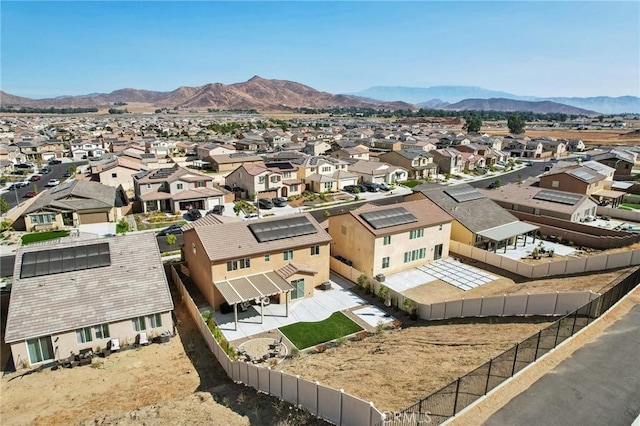 drone / aerial view featuring a mountain view