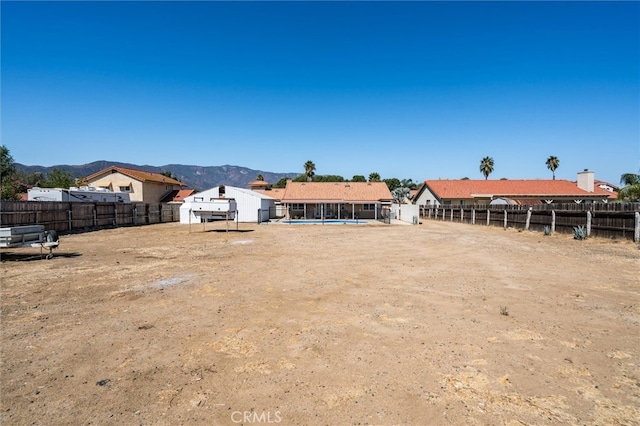 view of yard with a mountain view