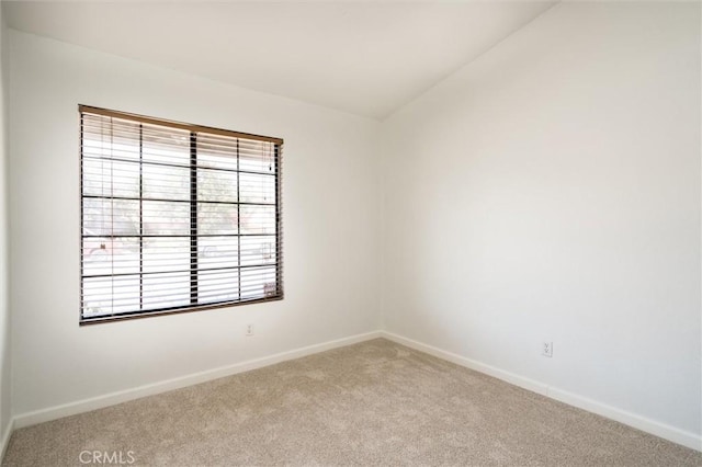 34578 Hickory Ln, Wildomar, CA 92595 - spare room featuring carpet, healthy amount of natural light, baseboards, and vaulted ceiling