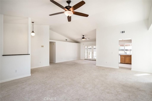 34578 Hickory Ln, Wildomar, CA 92595 - unfurnished living room featuring ceiling fan, plenty of natural light, light carpet, and vaulted ceiling