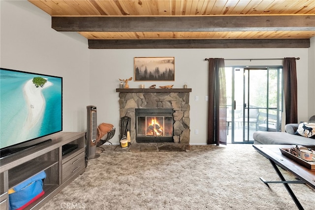 living room featuring wooden ceiling, carpet, a fireplace, and beam ceiling