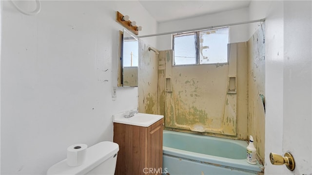 full bathroom with shower / tub combination, vanity, and toilet