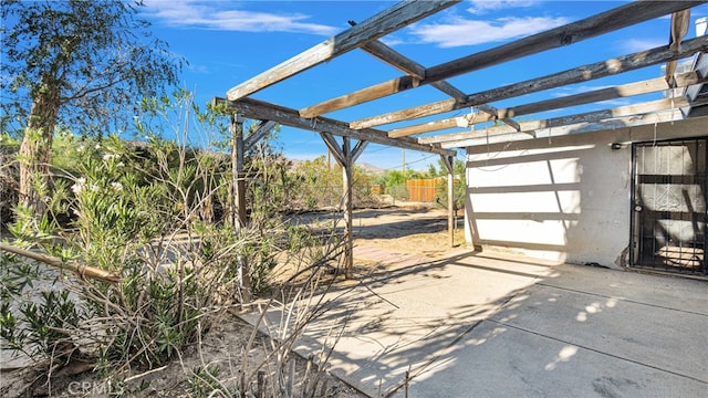 view of patio featuring a pergola