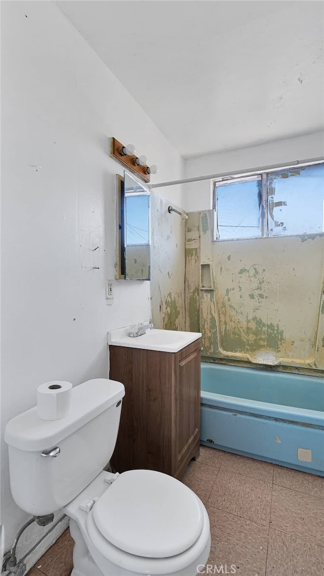 full bathroom with vanity, washtub / shower combination, and toilet