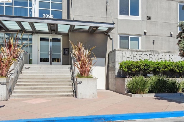 entrance to property featuring french doors