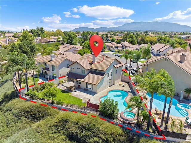 bird's eye view featuring a residential view and a mountain view