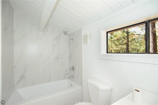 full bath featuring toilet, visible vents, beam ceiling, and shower / bathtub combination