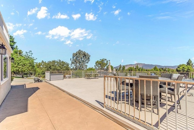 view of patio with a mountain view