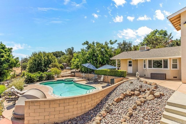 view of pool with a patio area