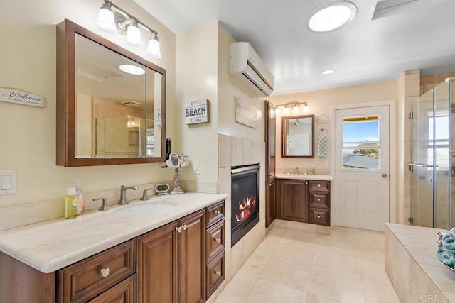 bathroom with a wall mounted air conditioner, vanity, a shower with door, tile patterned flooring, and a tiled fireplace