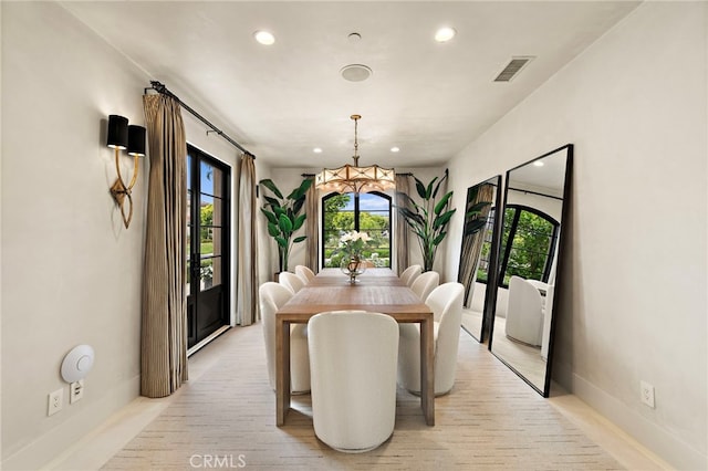 dining space featuring light hardwood / wood-style floors