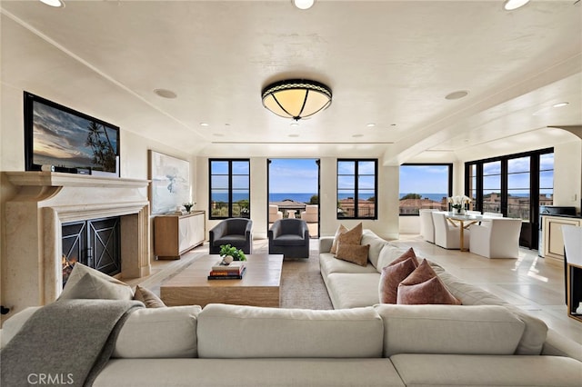 tiled living room featuring a fireplace