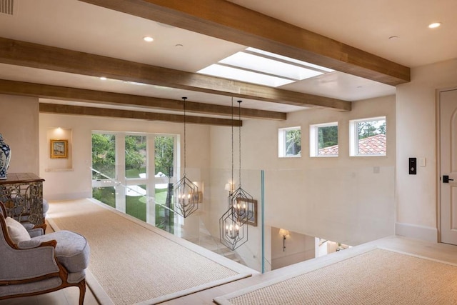 interior space featuring beamed ceiling