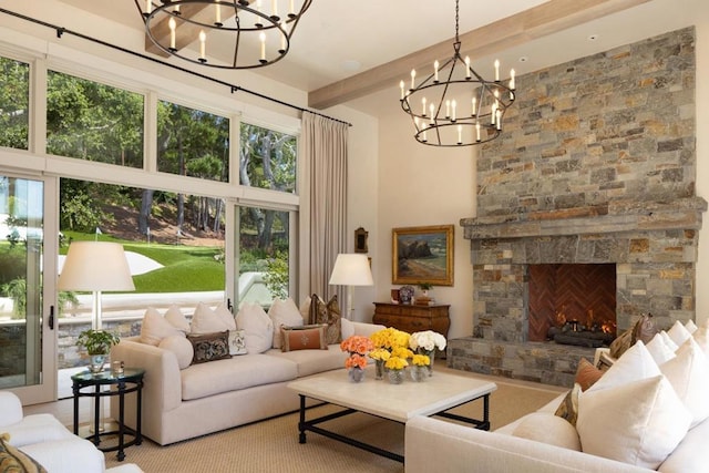 living room featuring a high ceiling, beamed ceiling, and a stone fireplace