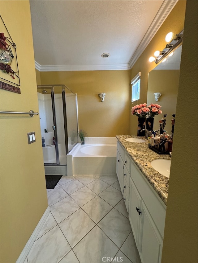 bathroom featuring independent shower and bath, vanity, ornamental molding, and tile patterned floors