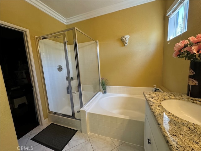 bathroom with plus walk in shower, tile patterned floors, vanity, and crown molding