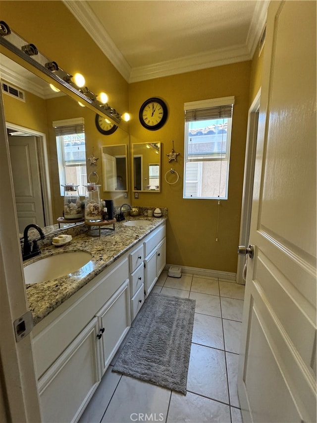 bathroom with ornamental molding, tile patterned flooring, and vanity