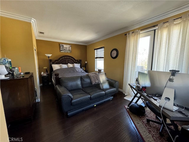 bedroom featuring ornamental molding and dark hardwood / wood-style flooring