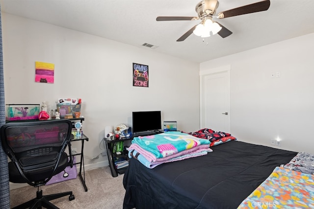 bedroom featuring ceiling fan and light colored carpet