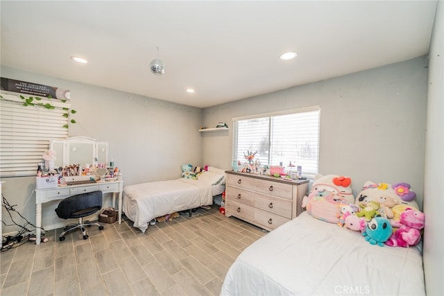 bedroom with light hardwood / wood-style floors