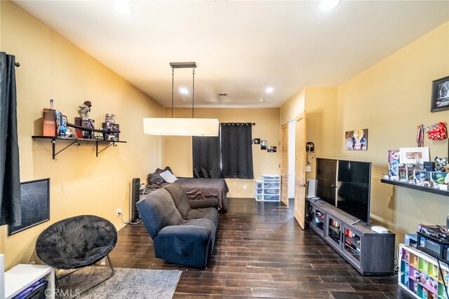 living room featuring dark hardwood / wood-style floors